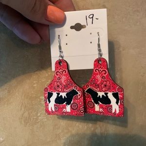 Cow tag style earrings